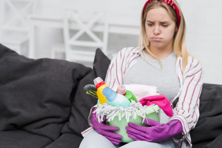 young woman tired cleaning - Caribbean Cleaning Srq